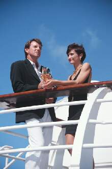 couple on cruise ship with champagne